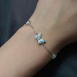 Pulsera de Plata Mariposa Azul que Brilla en la Oscuridad