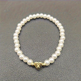 Pulsera Elegante de Corazón con Inicial