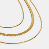 Collar de cadena dorada multicapa